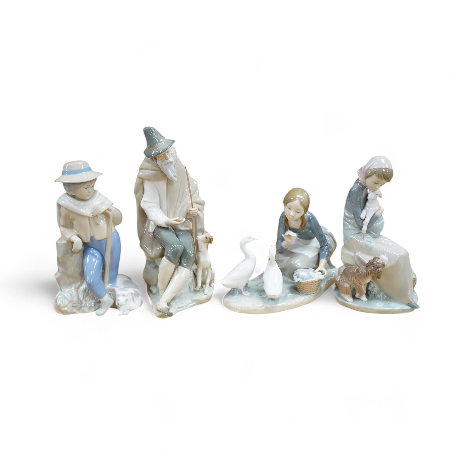 Four Lladro figures; elderly man with a dog, a girl with two ducks, a shepherdess and a boy shepherd, tallest 27cm. Condition - good